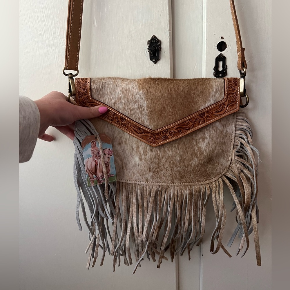 Real leather cross body purse. Real cow hyde. Never before used!